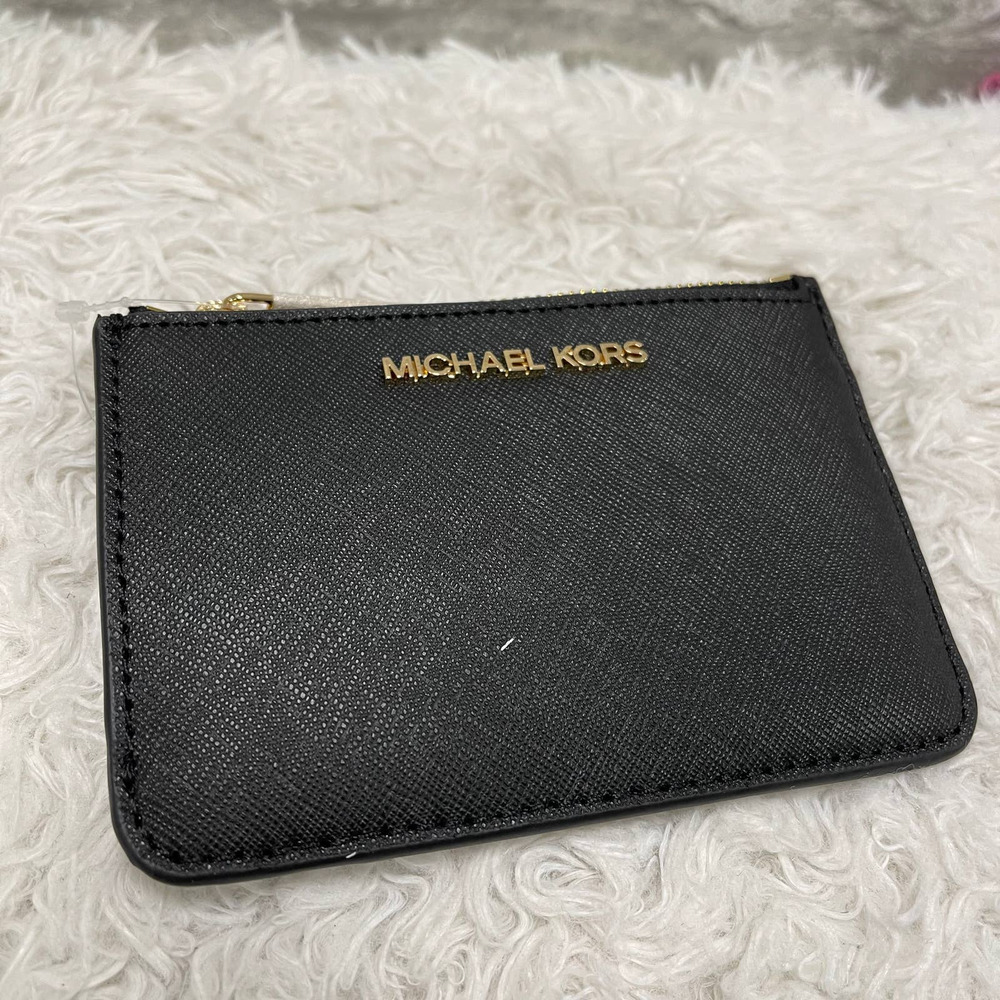 $188 Retail Brand new Michael Kors coin pouch with ID leather.